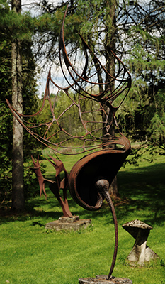 Metal sculpture of Ibis in the yard of Brick House Gallery